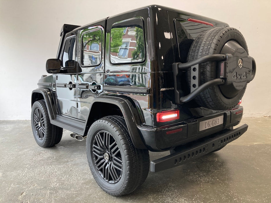 Mercedes G63 XL AMG Deluxe  Kinderauto 24V 4WD zwart metallic twee persoons - Trapautodealer