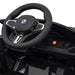 BMW M4 Competition Elektrische Kinderauto 12V + 2.4G RC (zwart) - Trapautodealer