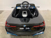 BMW i4 Elektrische kinderauto 12V  + 2.4G RC zwart metallic - Trapautodealer