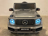Mercedes G63 AMG Kinderauto 12V + 2.4G RC (zilvergrijs) - Trapautodealer