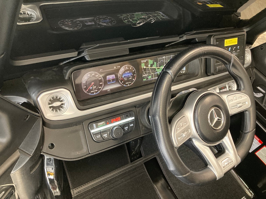 Mercedes G63 XL AMG Deluxe  Kinderauto 24V 4WD zwart metallic twee persoons - Trapautodealer