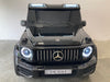 Mercedes G63 XL AMG Deluxe  Kinderauto 24V 4WD zwart metallic twee persoons - Trapautodealer