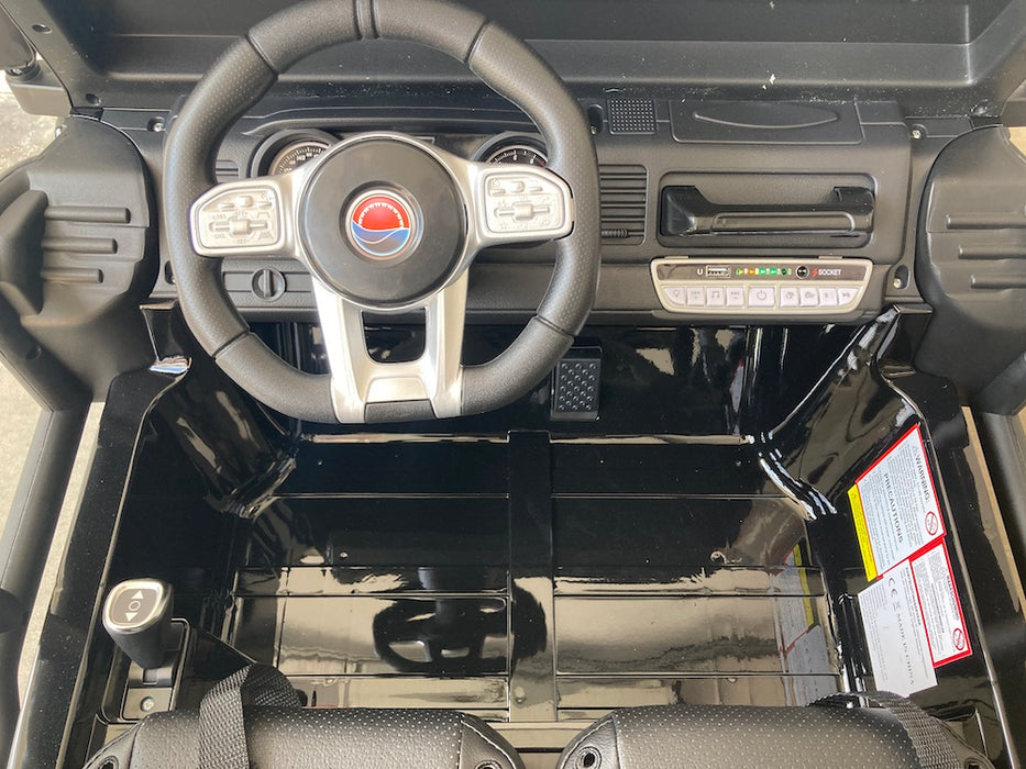 Elektrische Kinderjeep Gravity 12V + 2.4RC (zwart) - Trapautodealer