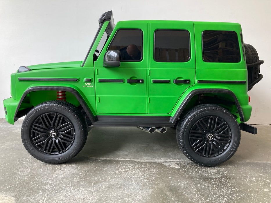Mercedes G63 XL AMG accu Kinderauto 24V 4WD mat groen twee persoons - Trapautodealer