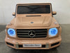 Mercedes G500 elektrische kinderauto 12V + 2.4G RC (beige) - Trapautodealer